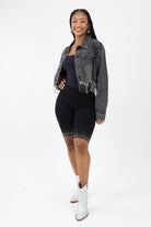 Rhinestone black biker shorts with silver sparkly boots and a jean fringe jacket