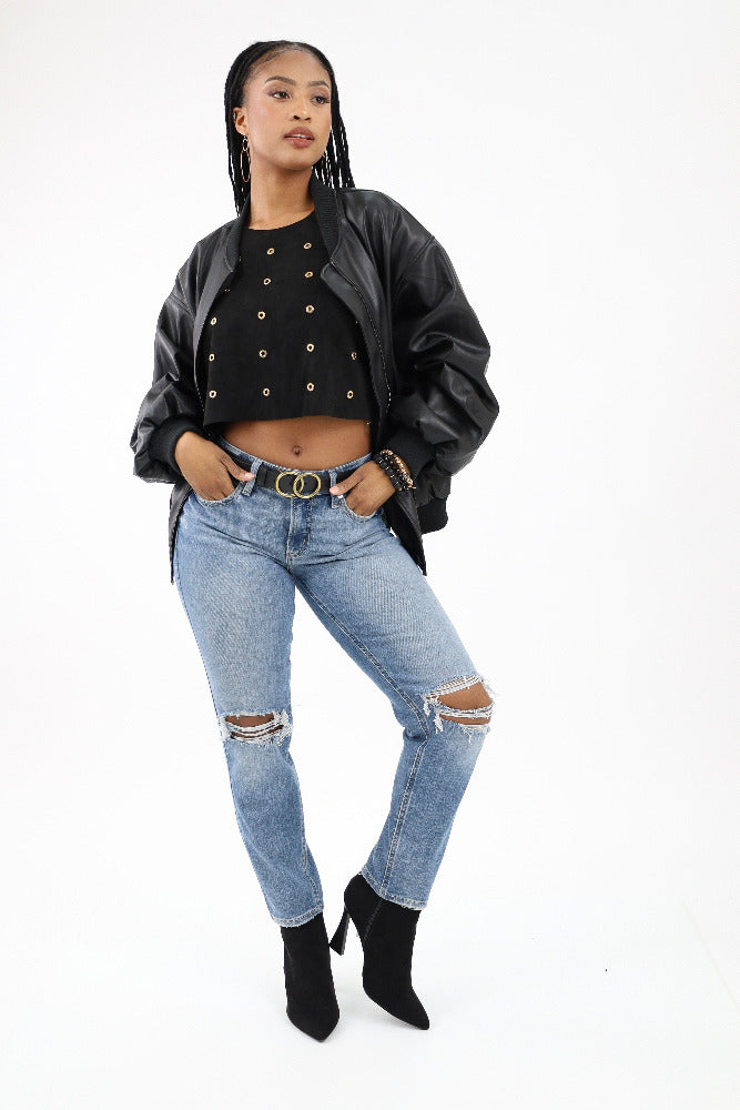 Boho crop top paired with a bomber jacket and jeans