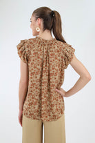 Back of brown floral color blouse