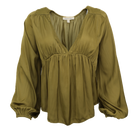 Green satin blouse flatlay