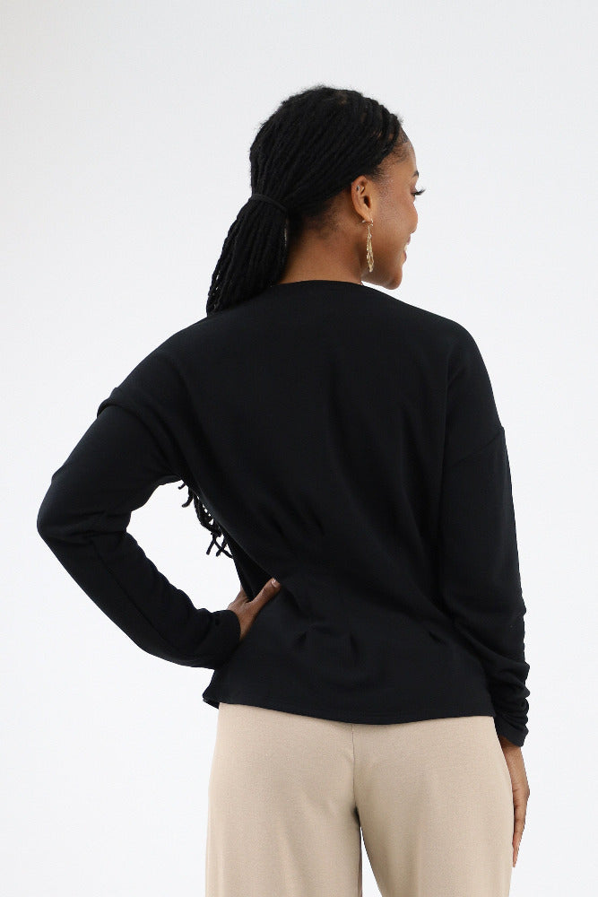 Back of Black Peplum Drop Shoulder Top