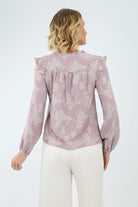 Back of Lavendar textured ruffle sleeve blouse