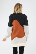 Back of black colorblock knit sweater dress