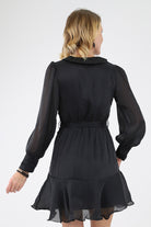 Back of Black Ruffle Hem Mini Dress