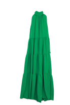 Green halter tie back dress flatlay