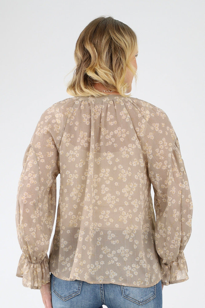 Back of semi sheer beige Floral Ruffle Blouse