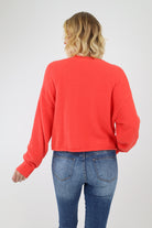 Back of Red Oversized Cardigan Sweater