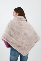 Back of Cream Faux Fur Poncho