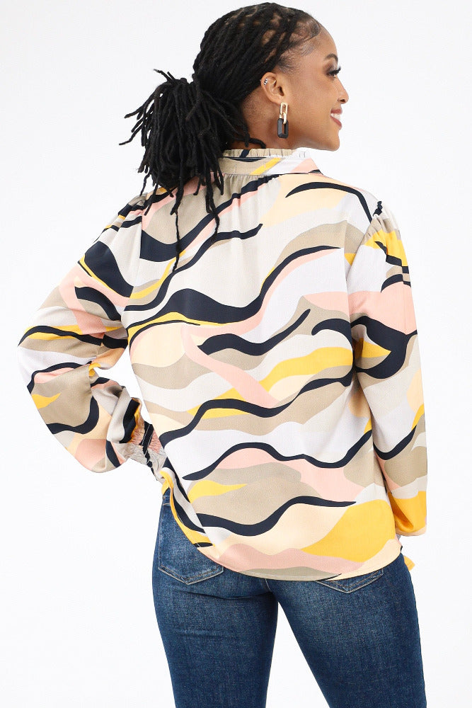 Back of beige abstract blouse