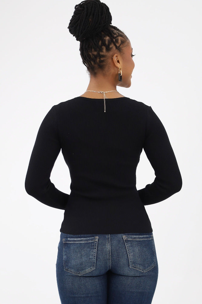 Back of Black Ribbed Knit Top